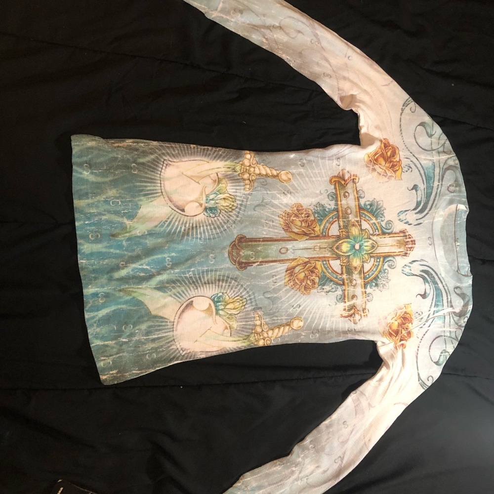 Sinful long sleeve top with graphics / print on it